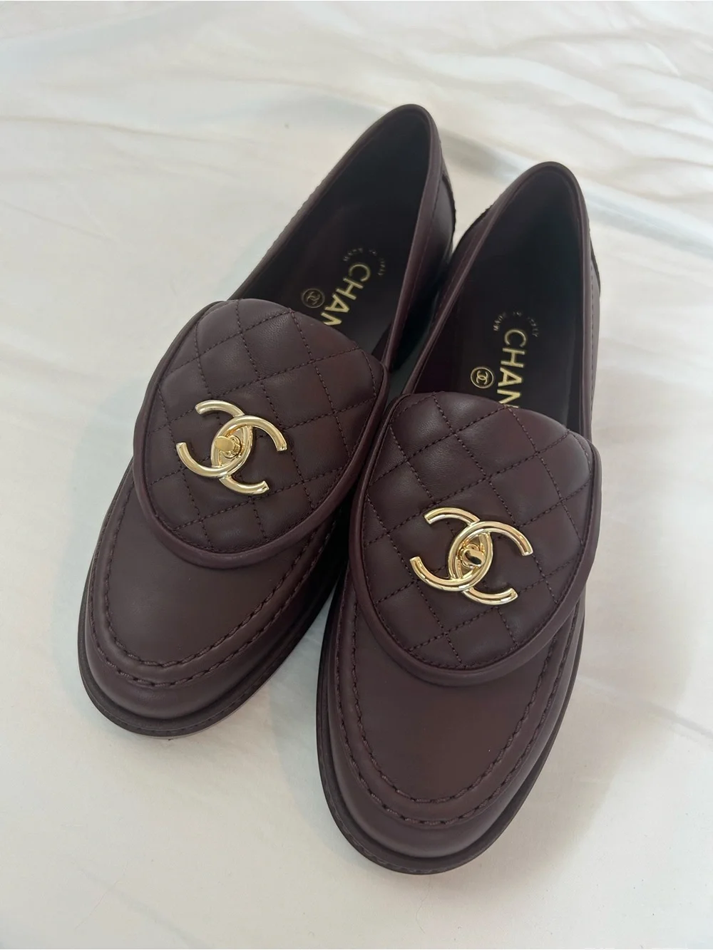 Chanel 2025 turnlock quilted loafers in burgundy 37
